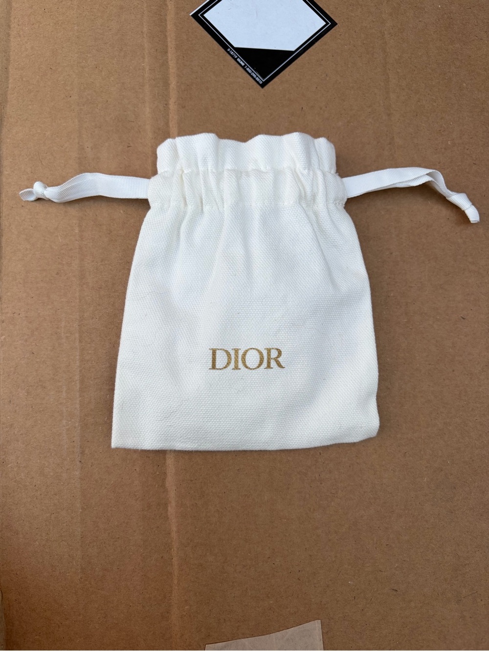 Dior Cream Drawstring Pouch with Gold Logo